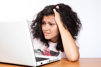 Confused and frustrated woman on computer Confused and frustrated woman on computer