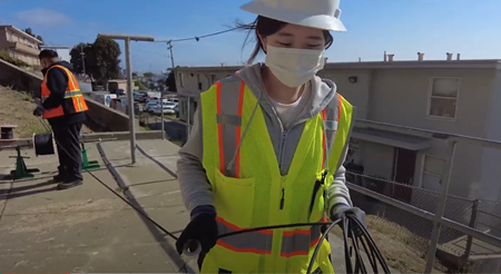 San Francisco technicians deploying fiber across roof
