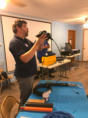 Digital Op Lab Chris holding splicer Digital Op Lab Chris holding splicer