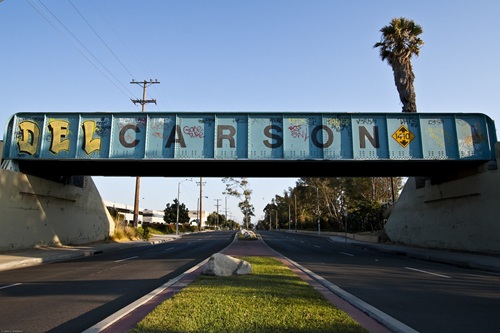 Carson CA Main St Rail Overpass  Street rail overpass in Carson with the city name spelled out on side of overpass by spraypaint