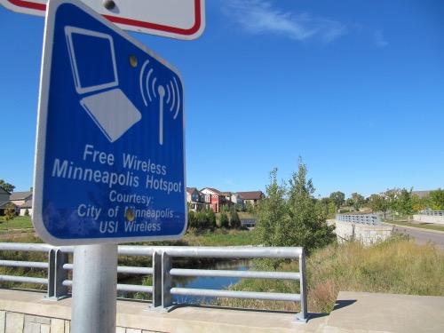 Free WiFi hotspot sign in Minneapolis A blue sign reads: "Free Wireless hotspot Minneapolis"