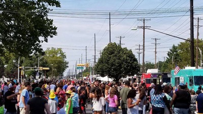 Vineland NJ annual food truck festival Hundreds of residents gather in street milling around the annual food truck festival