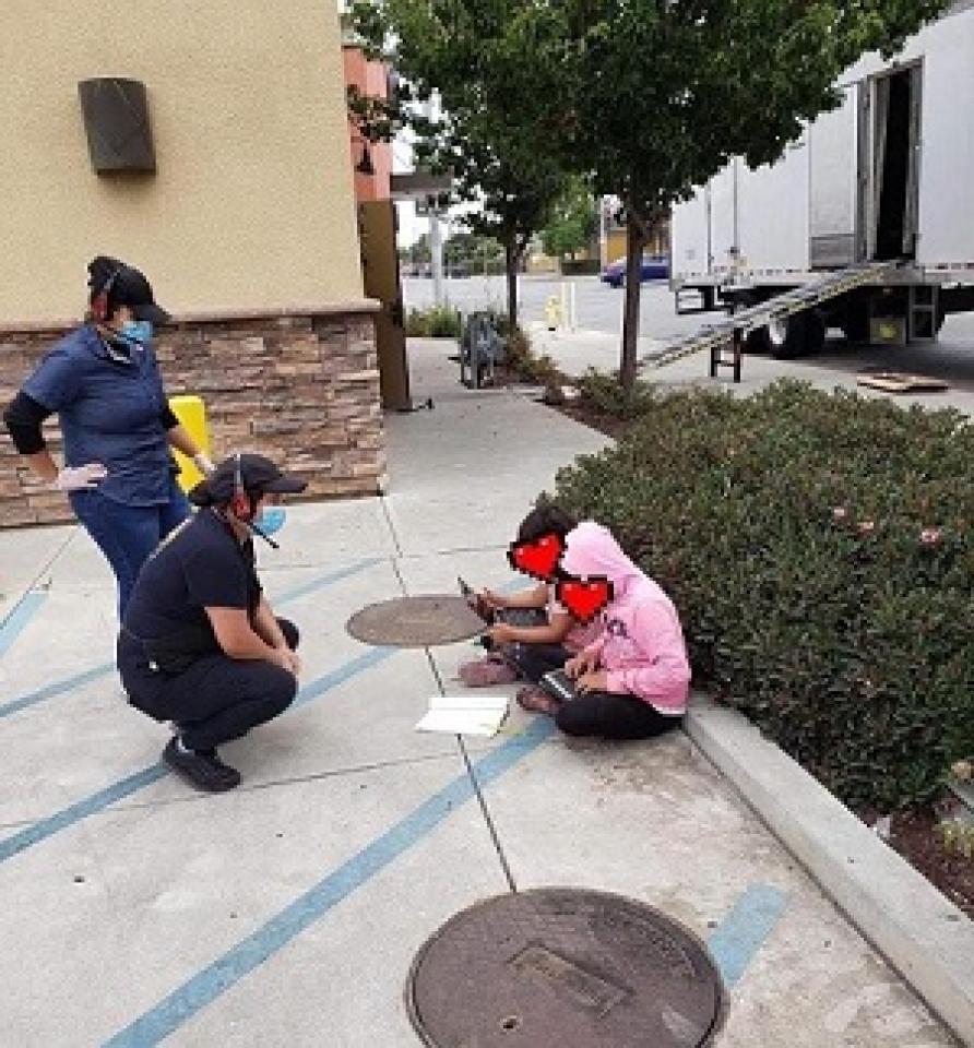 students in fast food lot using WiFi students in fast food lot using WiFi