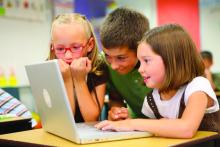 Students using laptop for school